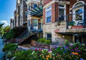 Historic buildings with colorful flowers in Adams Morgan neighborhood